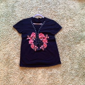 the clas-sic, black t-shirt. Size: small. Comfortable. Good condition